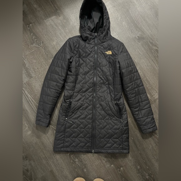 The North Face Jackets & Blazers - The North Face Black Quilted Jacket with Gold Logo
